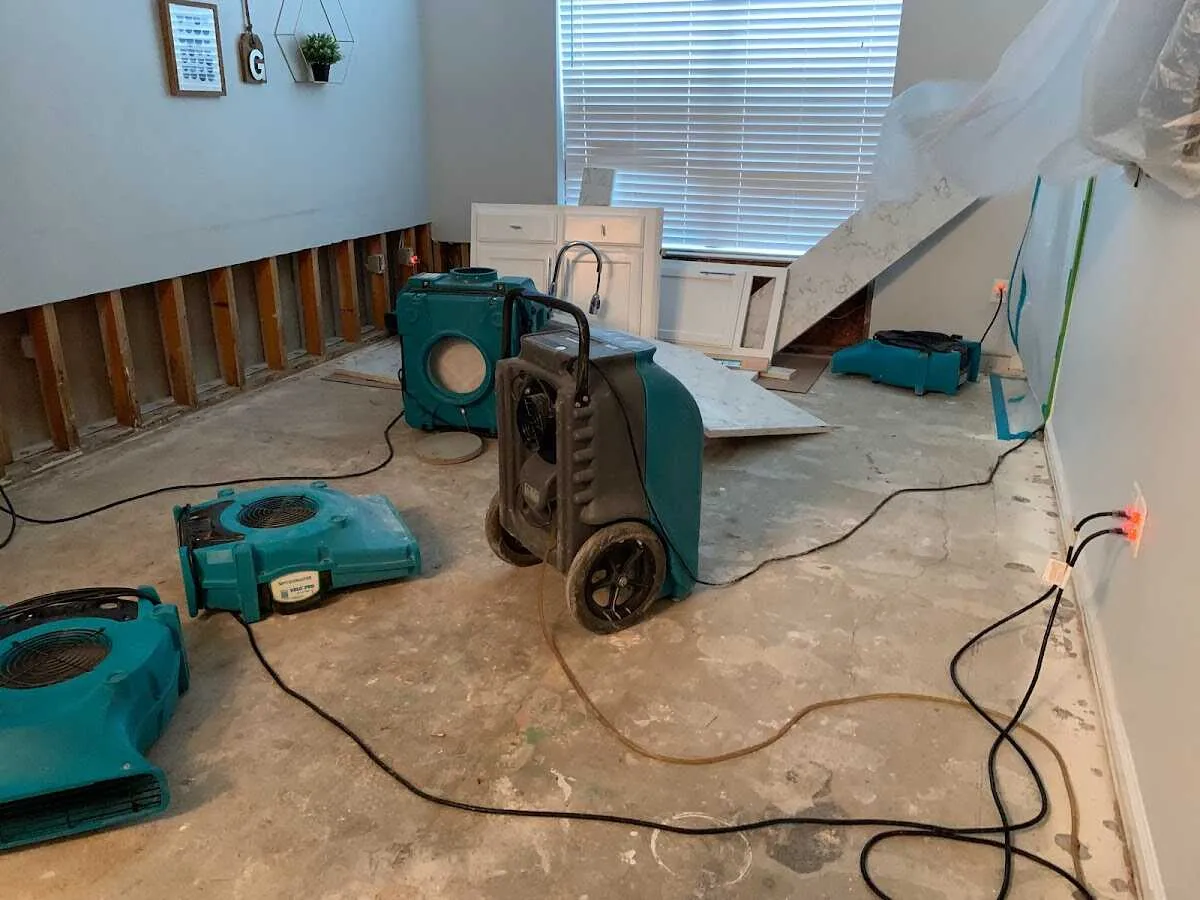Dehumidifier in flood-cut room for Water Damage Restoration in Caln